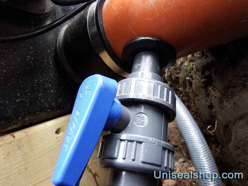 One inch Uniseal connects into four inch pipe